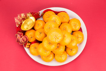 Naklejka na ściany i meble Mandarin oranges, gold nuggets, red packets, Chinese good luck character