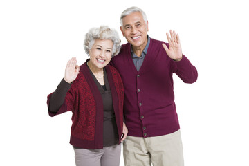 Cheerful senior couple greeting for Chinese New Year