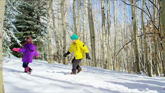 playing snow outdoor lifestyle Caucasian family promotion winter vacation