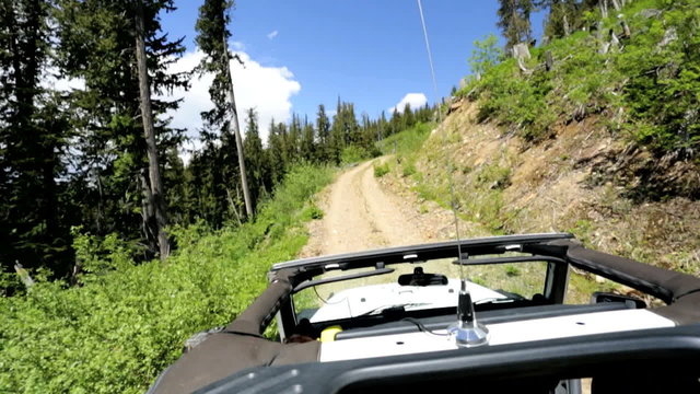 POV 4x4 driving jeep vehicle Wilderness safari mountain Canada