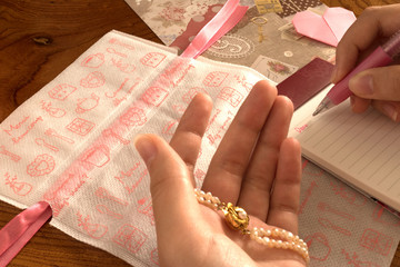 Bracelet of pearl, writing letter on Valentines