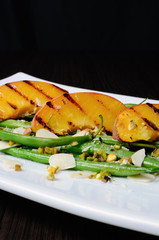 Salad of green beans with peaches