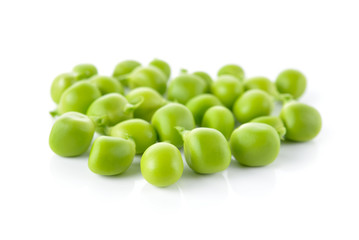 pile of sweet pea seed on white background