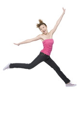 Fototapeta na wymiar Young woman in mid-air