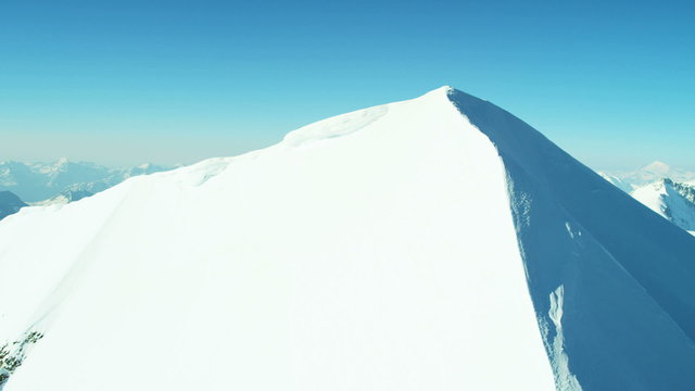 Aerial Swiss Monch summit Alps snow ice snow skiing 
