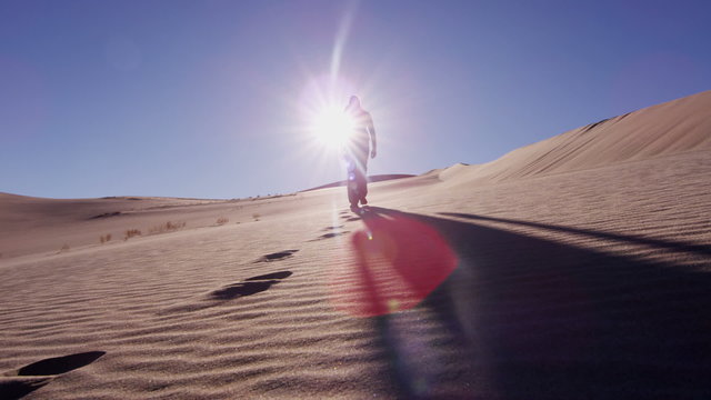 Traveller climber desert female sun adventure footprint hiker 
