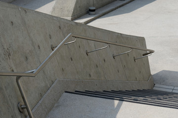 metal handrail on a concrete wall
