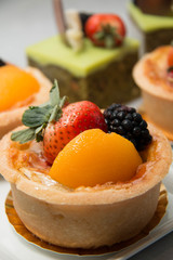 Fresh dessert fruit tart  in assorted tropical fruits