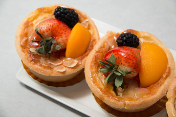 Fresh dessert fruit tart  in assorted tropical fruits