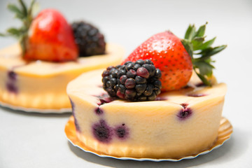  blueberry cheese cake on top  strawberry