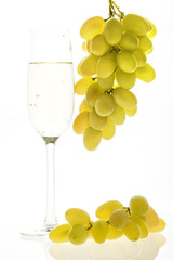 glass of champagne and grapes