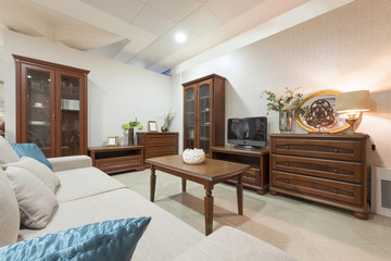 Living room interior with classic wooden furniture