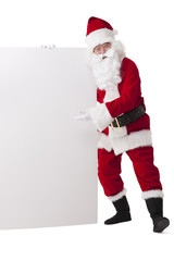 Santa Claus with blank whiteboard