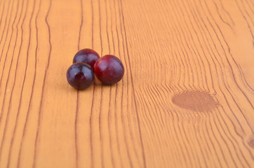 Fresh grape on wooden table.