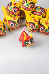 Chinese tiger stuffed animals in a heap
