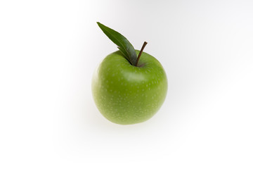 Green apple with leaf isolated on a white background