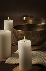 Fototapeta na wymiar Tibetan singing bowls with candles