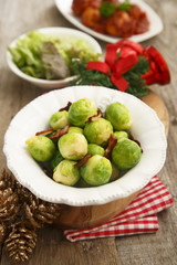 Brussel sprouts with fried bacon and butter