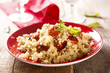 Couscous salad with tomatoes and herbs