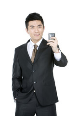 Young businessman using mobile phone