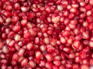 Red pomegranate seeds close up