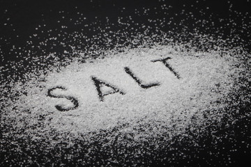 white salt on black