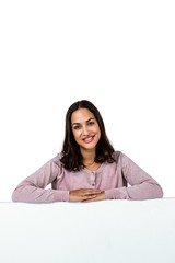 Portrait of smiling woman against white background