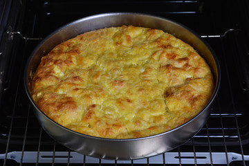 Traditional bulgarian food banitsa stuffed with cheese in electric oven
