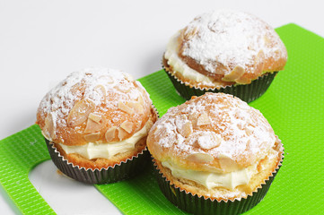 Three cake with whipped cream