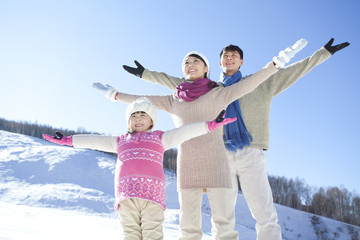 Family having fun in snow