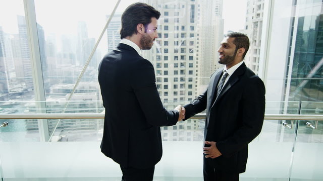 handshake Middle Eastern American business male real estate property development