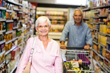 Happy senior woman smiling at camera 