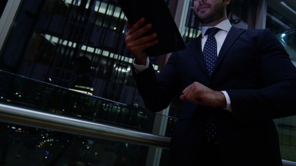 Caucasian European business male night developer traveller technology tablet