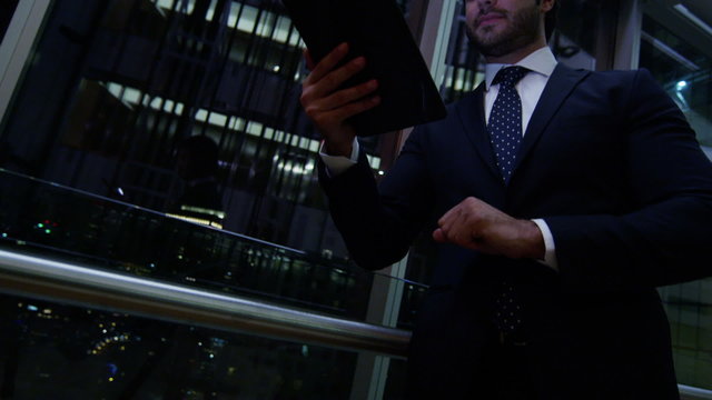 Caucasian European business male night developer traveller technology tablet
