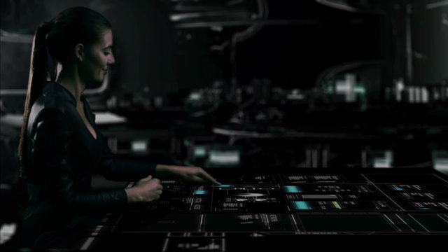 African American businesswoman using futuristic table touch screen technology