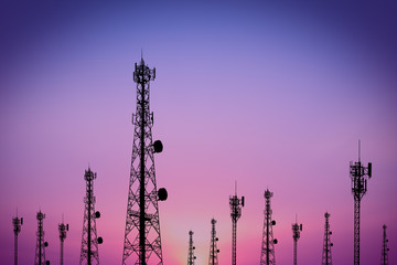 Silhouette phone antenna.Sunset background