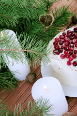 Holiday layered cake with cream and cranberry decoration