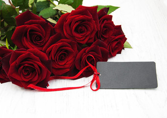Red roses and greeting card