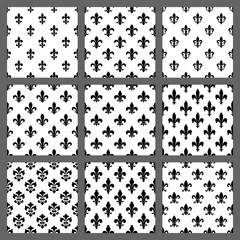 Fleur de lis seamless patterns set © gomolach