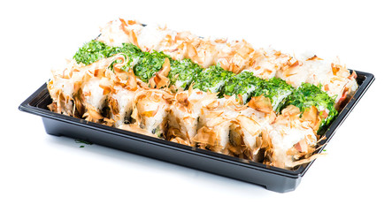 close-up of sushi roll in the black box, Sushi delivery. shallow