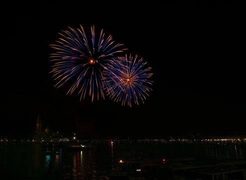 Big colorful fireworks explode in Venice in dark sky,New Year fireworks in Venice, 4 July, Independence, fireworks explode, New Year, Venice, Italy