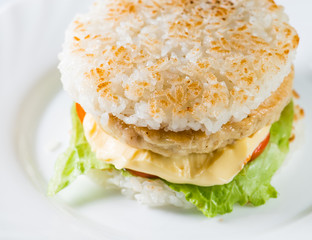 close-up of  Japanese food, grilled meat in Rice burger, served