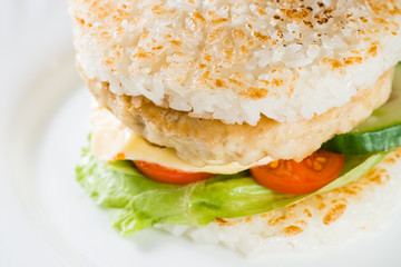 close-up of  Japanese food, grilled meat in Rice burger, served