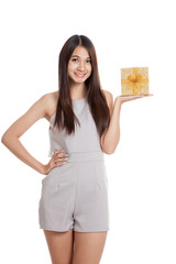 Beautiful young Asian woman with golden gift box