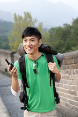 Young people go hiking on the Great Wall