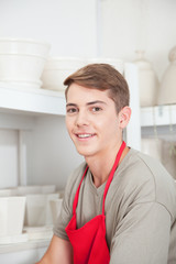 Male portrait in a ceramics shop