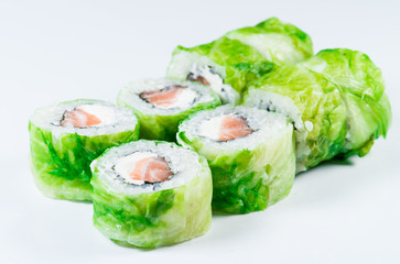 close-up of  Japan sushi roll with salmon and green lettuce (sha