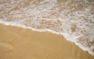Ocean wave on sand