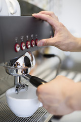 Barista making coffee