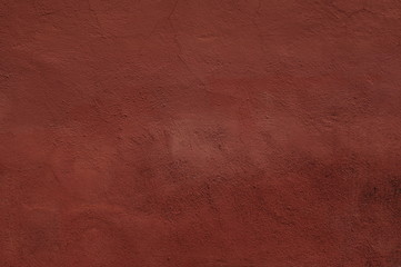 Intonaco colorato su parete di cemento